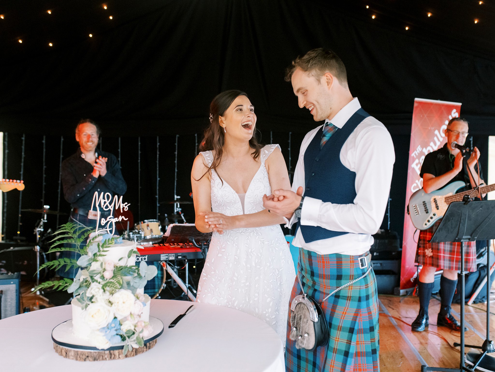 119-yester-estate-wedding-east-lothian-scotland-cake-cut.jpg