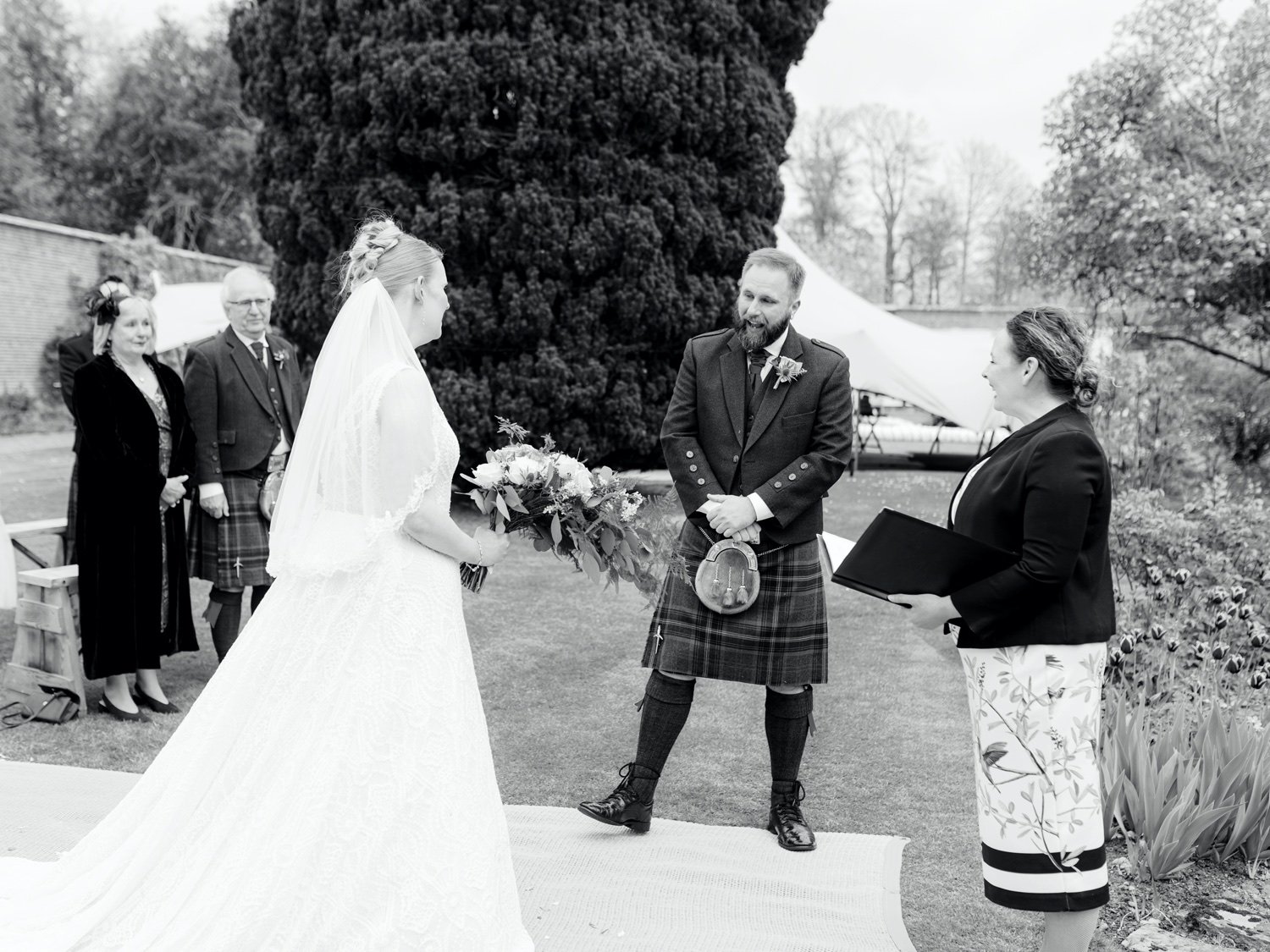 14_groom seeing bride for the first time at leuchie walled garden near north berwick east lothian scotland.jpg