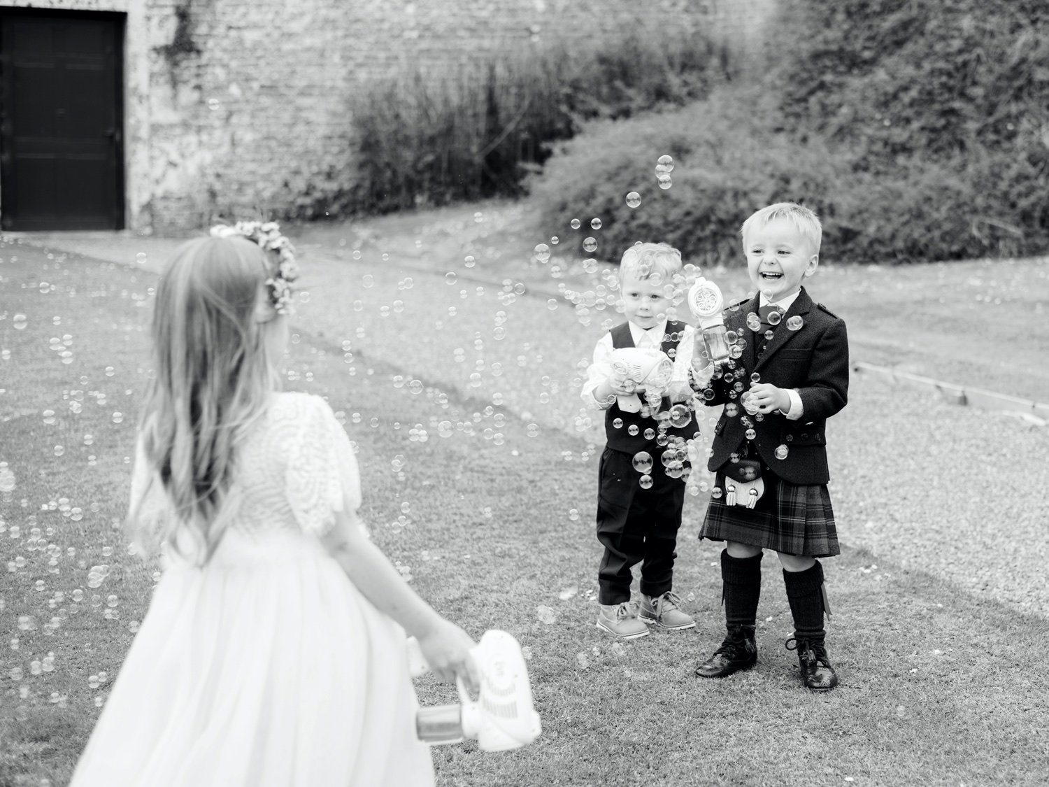 40_children enjoying bubbles at leuchie walled garden near north berwick east lothian scotland.jpg