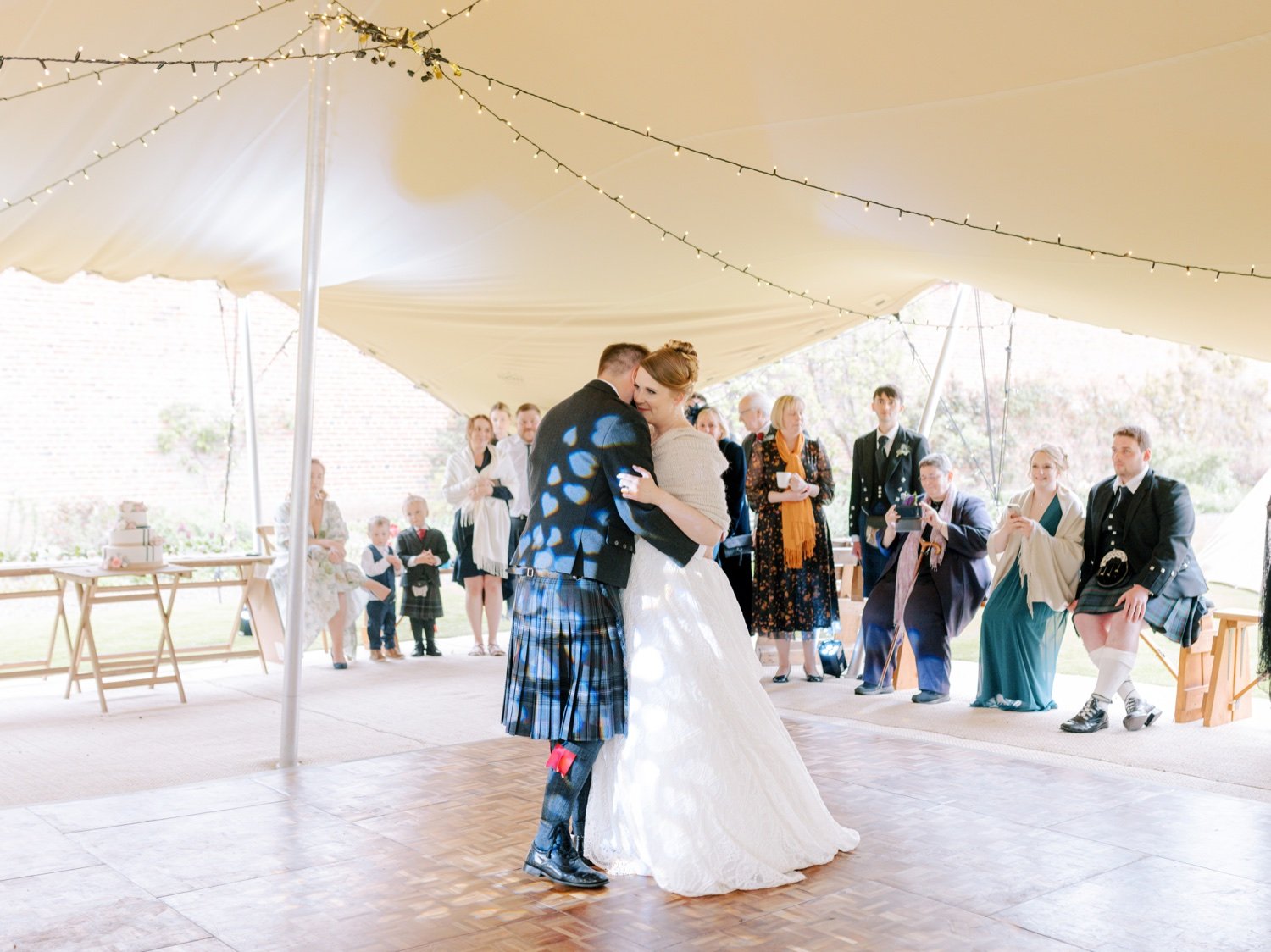 50_bride and groom dancing at leuchie walled garden near north berwick east lothian scotland.jpg