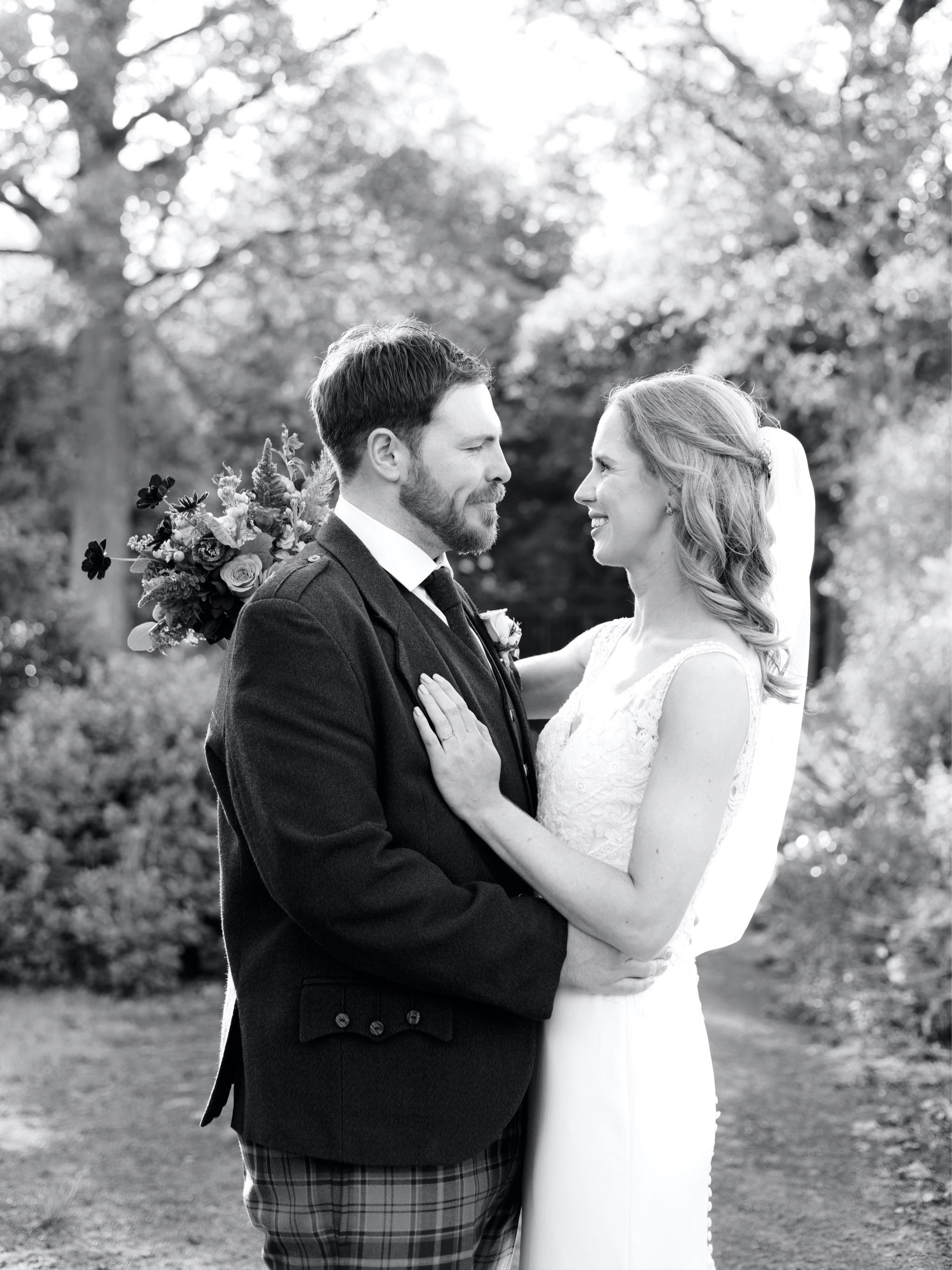 21_wedding photographer kirknewton house stables edinburgh bride and groom in the grounds.jpg