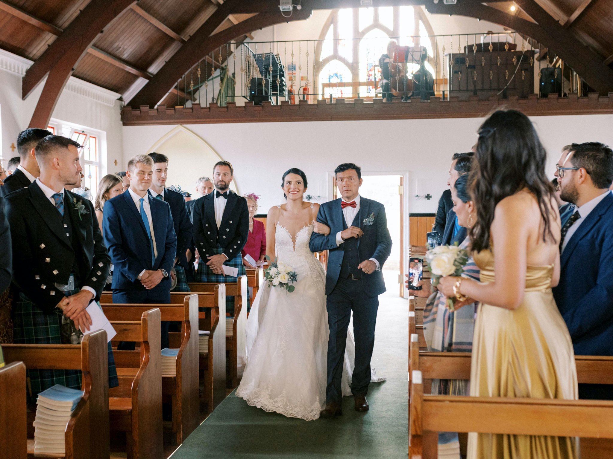 12_bride and her dad walking down the aisle St Margaret's Catholic Church South Queensferry Edinburgh.jpg