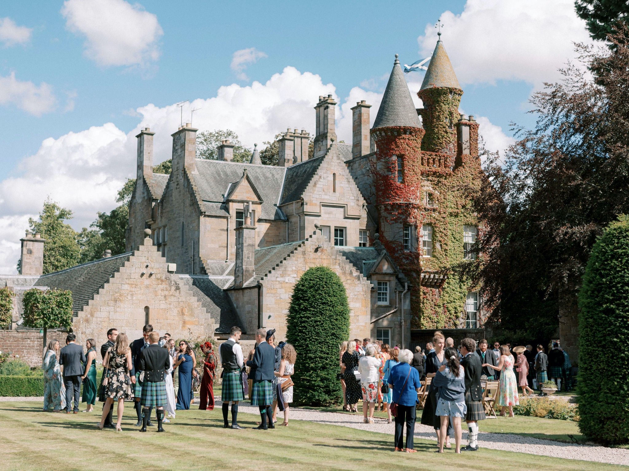 34_carlowrie castle edinburgh wedding photographer guests during reception.jpg