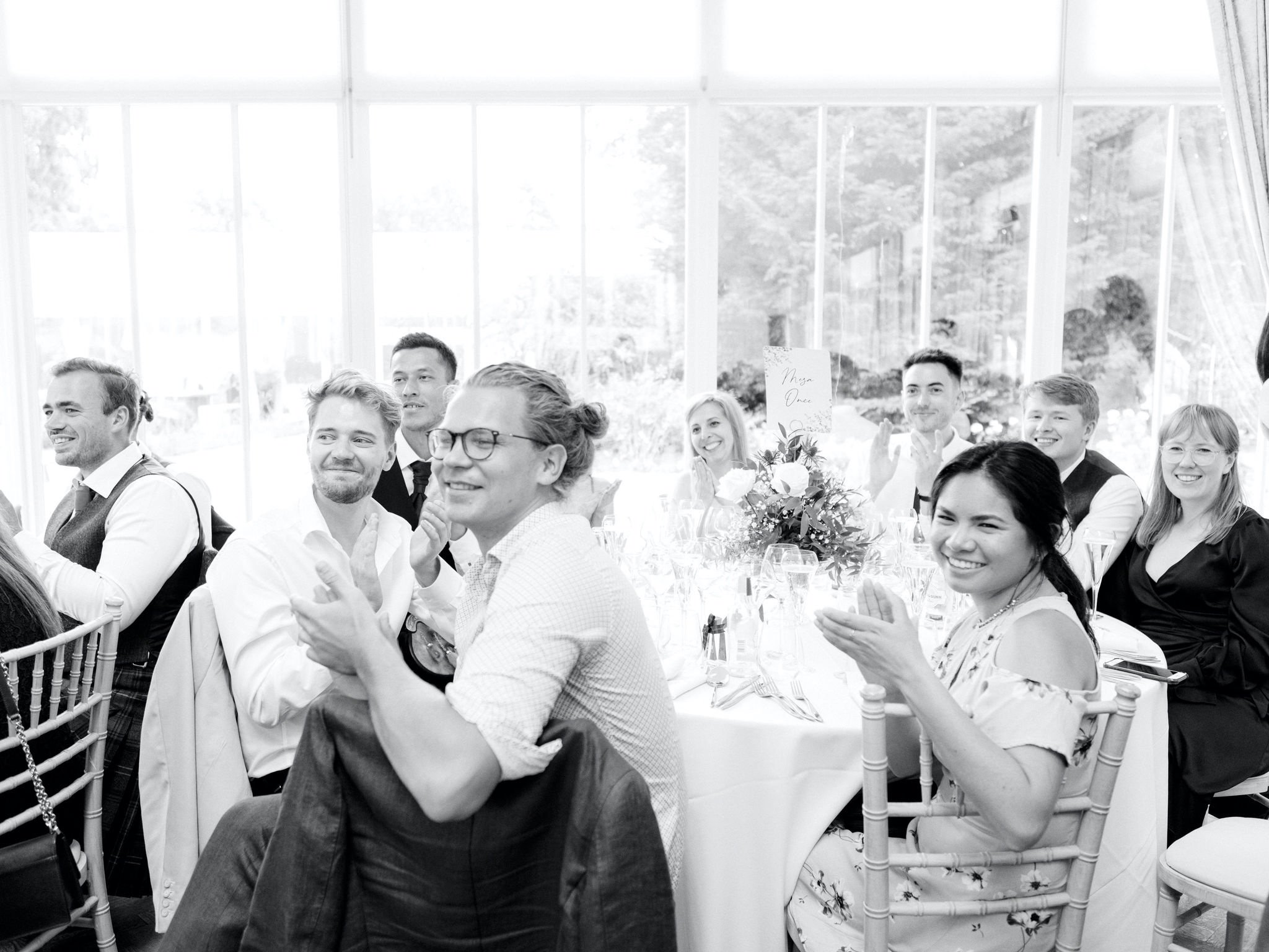 49_carlowrie castle edinburgh wedding photographer guests clapping during speeches.jpg