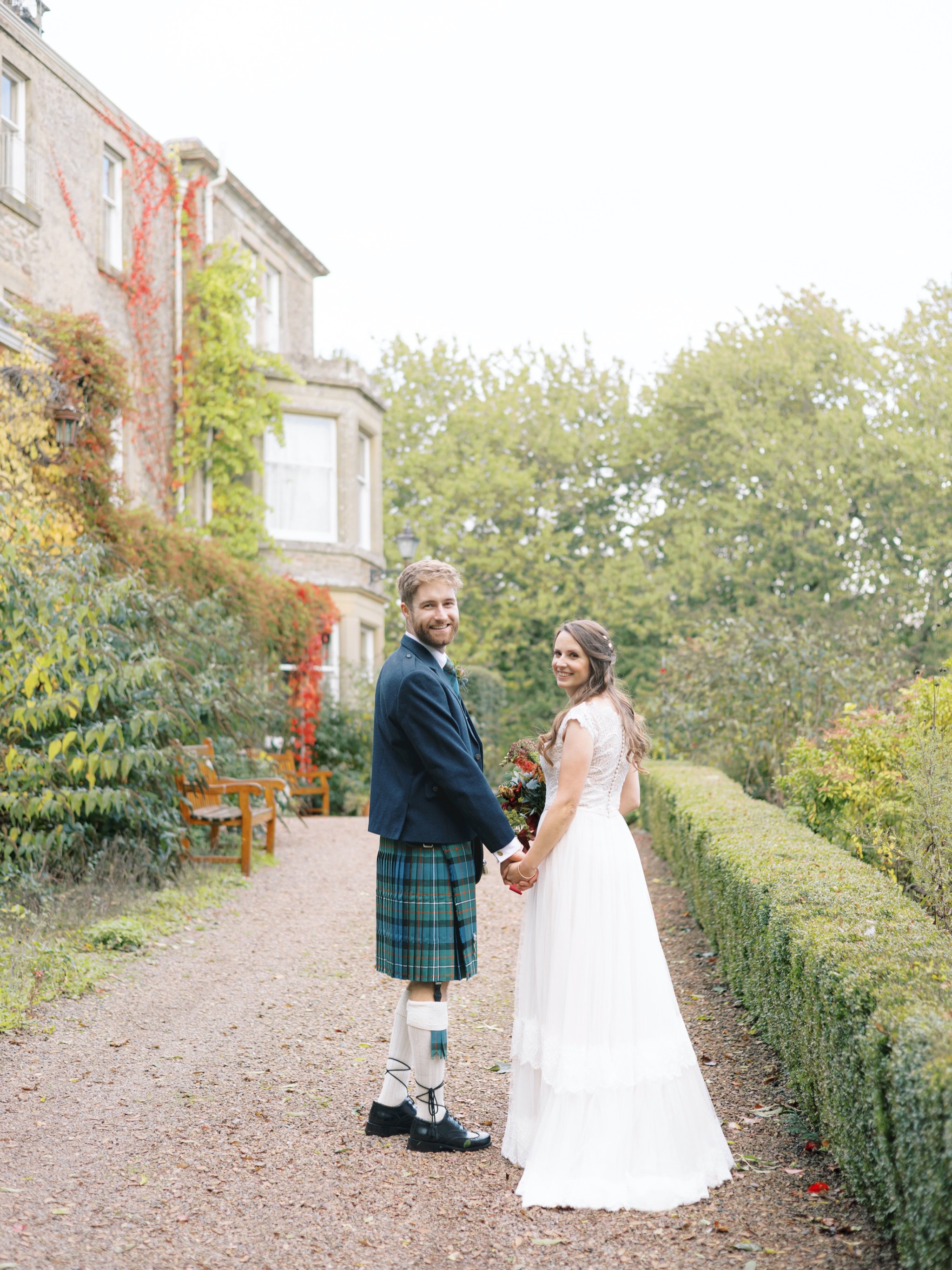 27_wedderlie house melrose scottish borders wedding photographer bride and groom outside venue .jpg