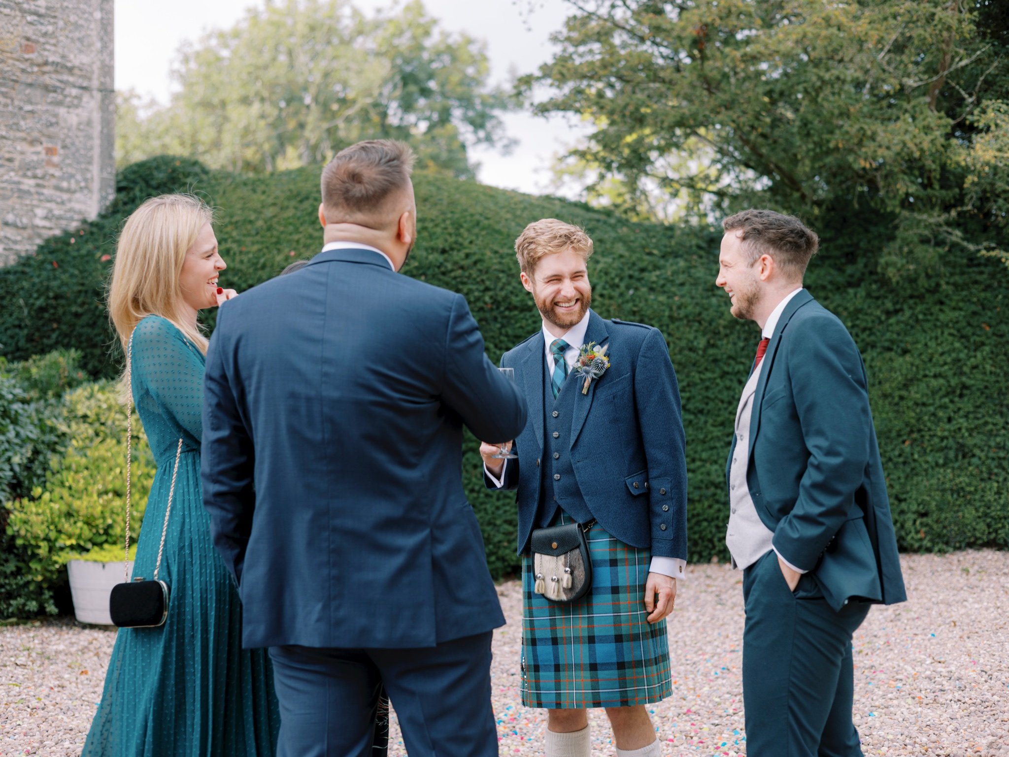 34_wedderlie house melrose scottish borders wedding photographer groom with guests.jpg