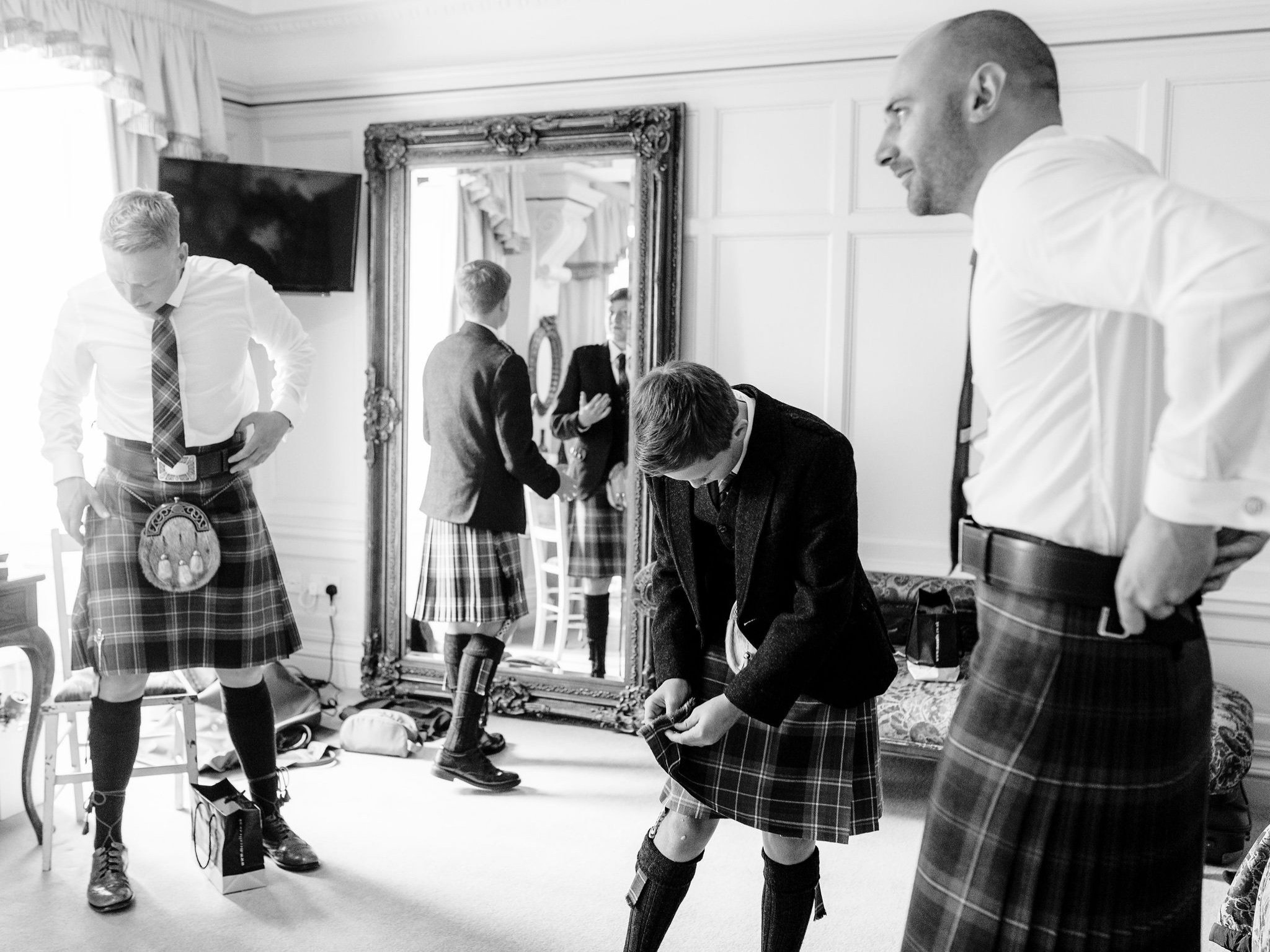 17_springkell-house-wedding-photographer-dumfries-scotland-groom-preparations.jpg