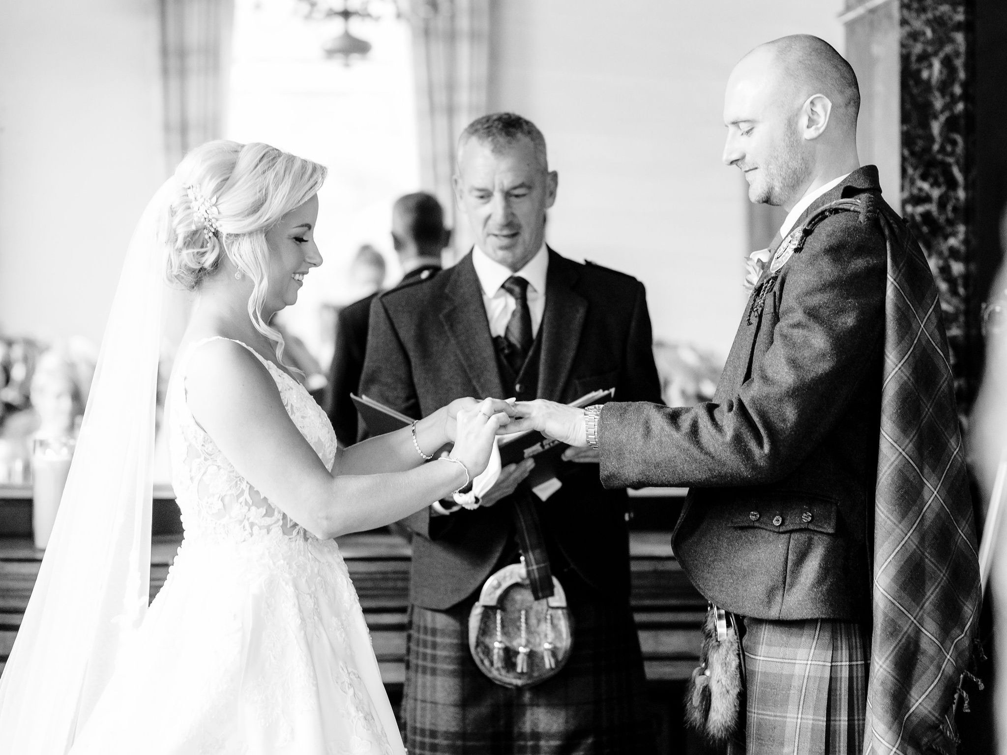27_springkell-house-wedding-photographer-dumfries-scotland-exhange-of-rings.jpg
