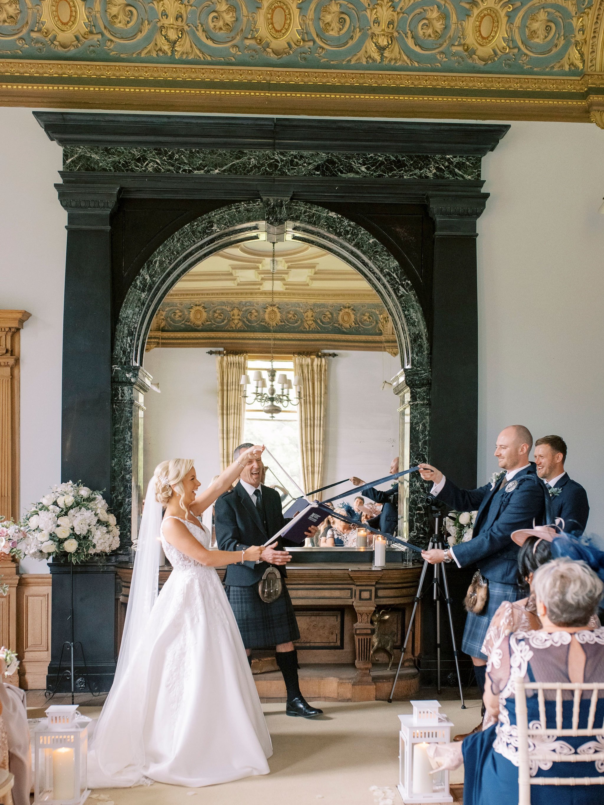 25_springkell-house-wedding-photographer-dumfries-scotland-handfasting-tieing-the-knot.jpg