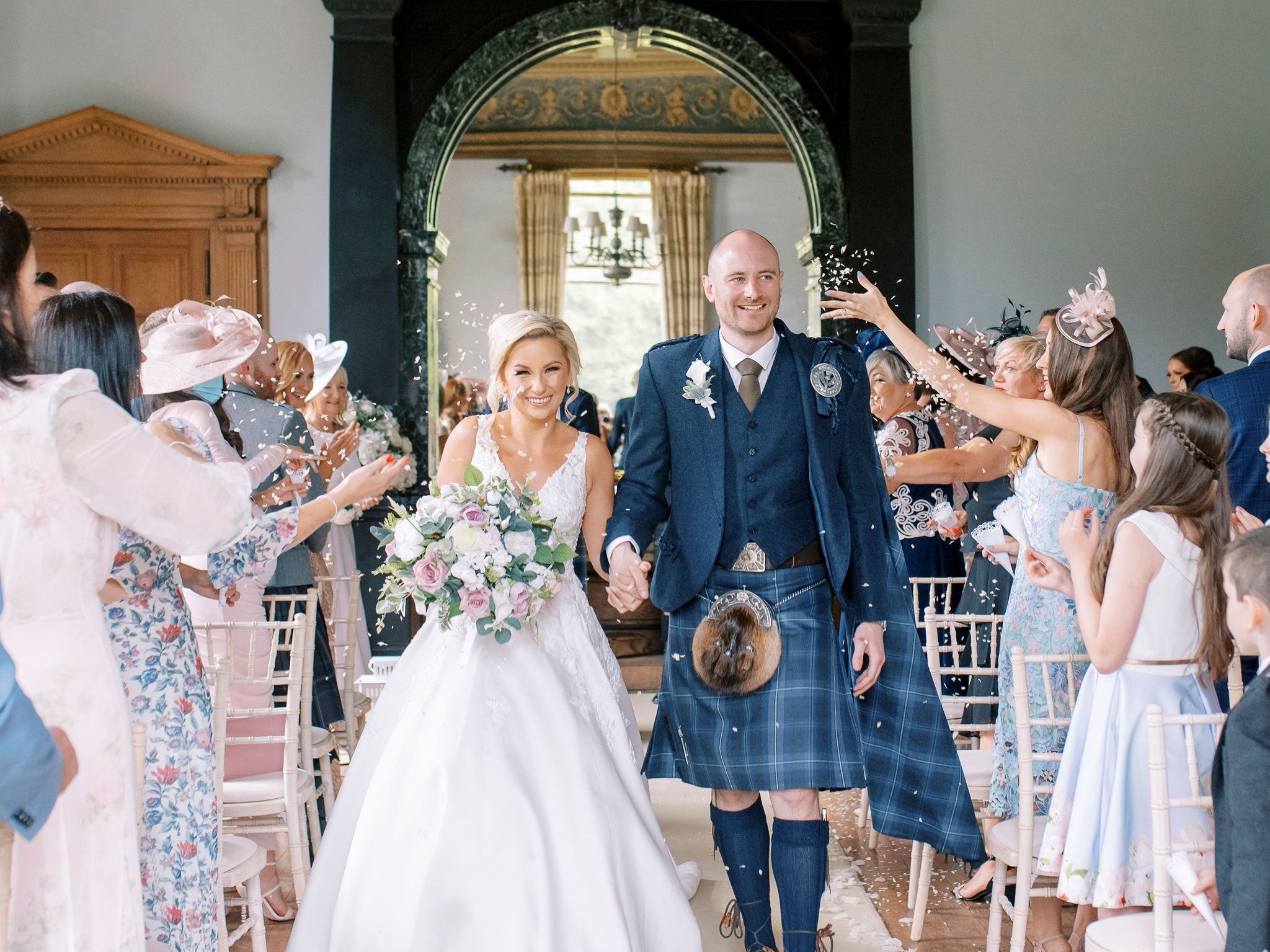 29_springkell-house-wedding-photographer-dumfries-scotland-confetti-toss.jpg