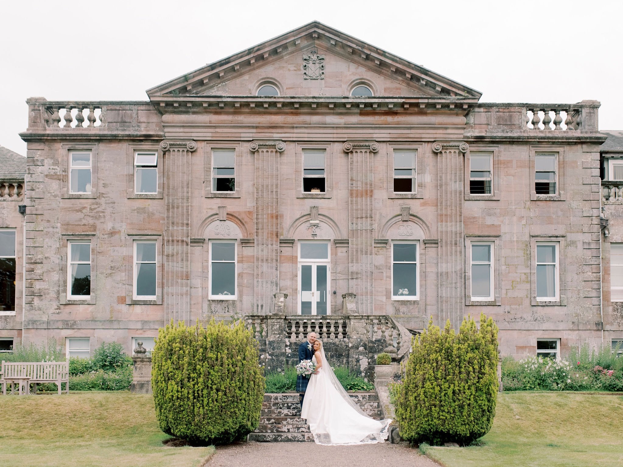 33_springkell-house-wedding-photographer-dumfries-scotland-portrait-on-steps.jpg