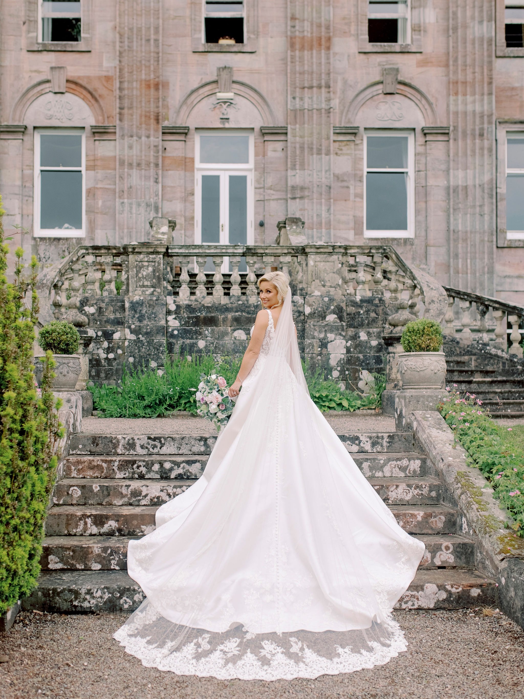 34_springkell-house-wedding-photographer-dumfries-scotland-back-wedding-dress-veil-train.jpg