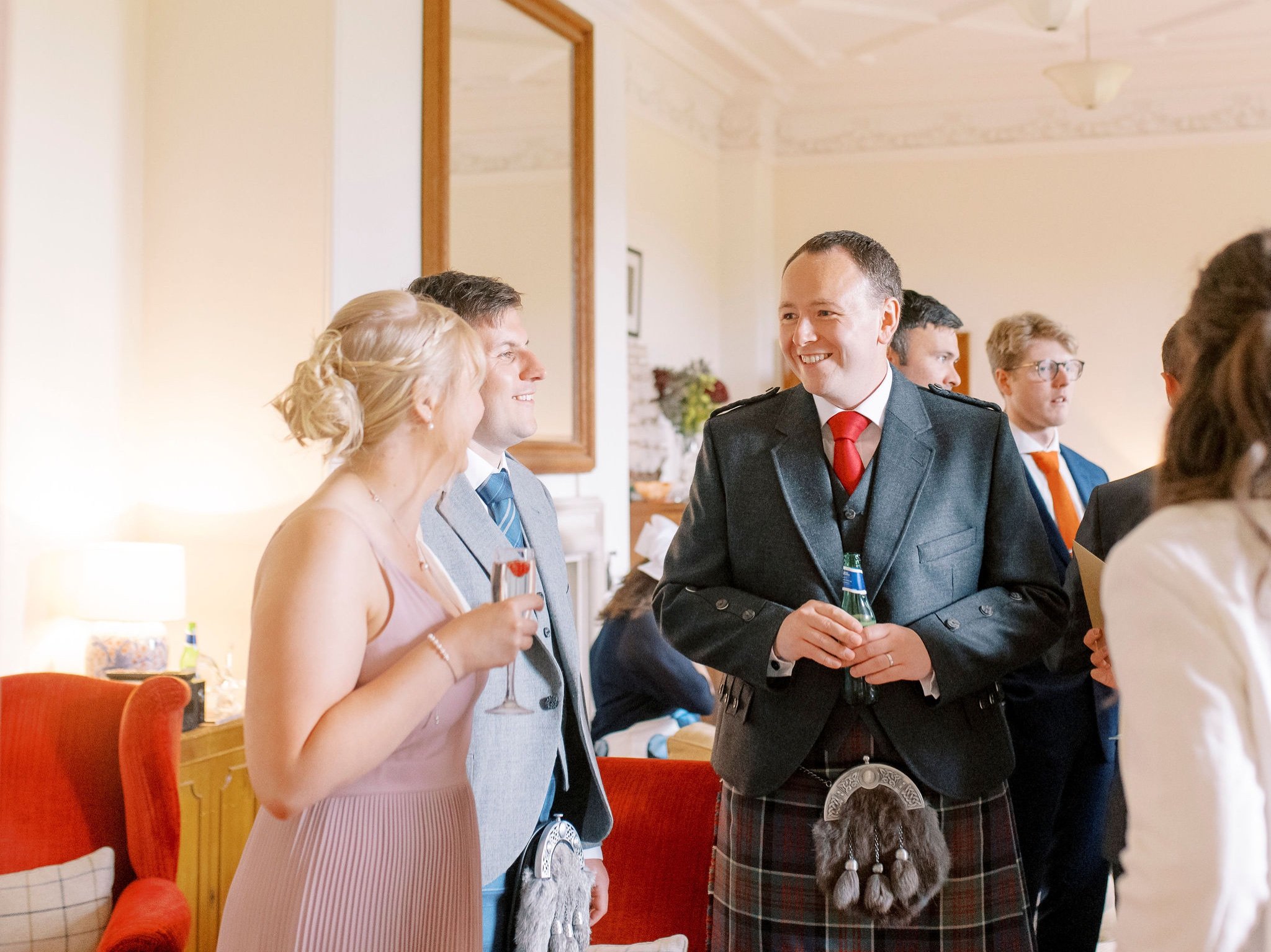 45_springkell-house-wedding-photographer-dumfries-scotland-wedding-guests-kilt.jpg
