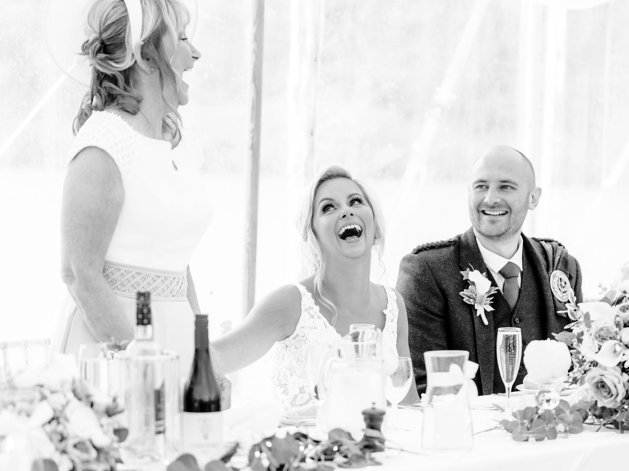 54_springkell-house-wedding-photographer-dumfries-scotland-wedding-speeches-laughing.jpg