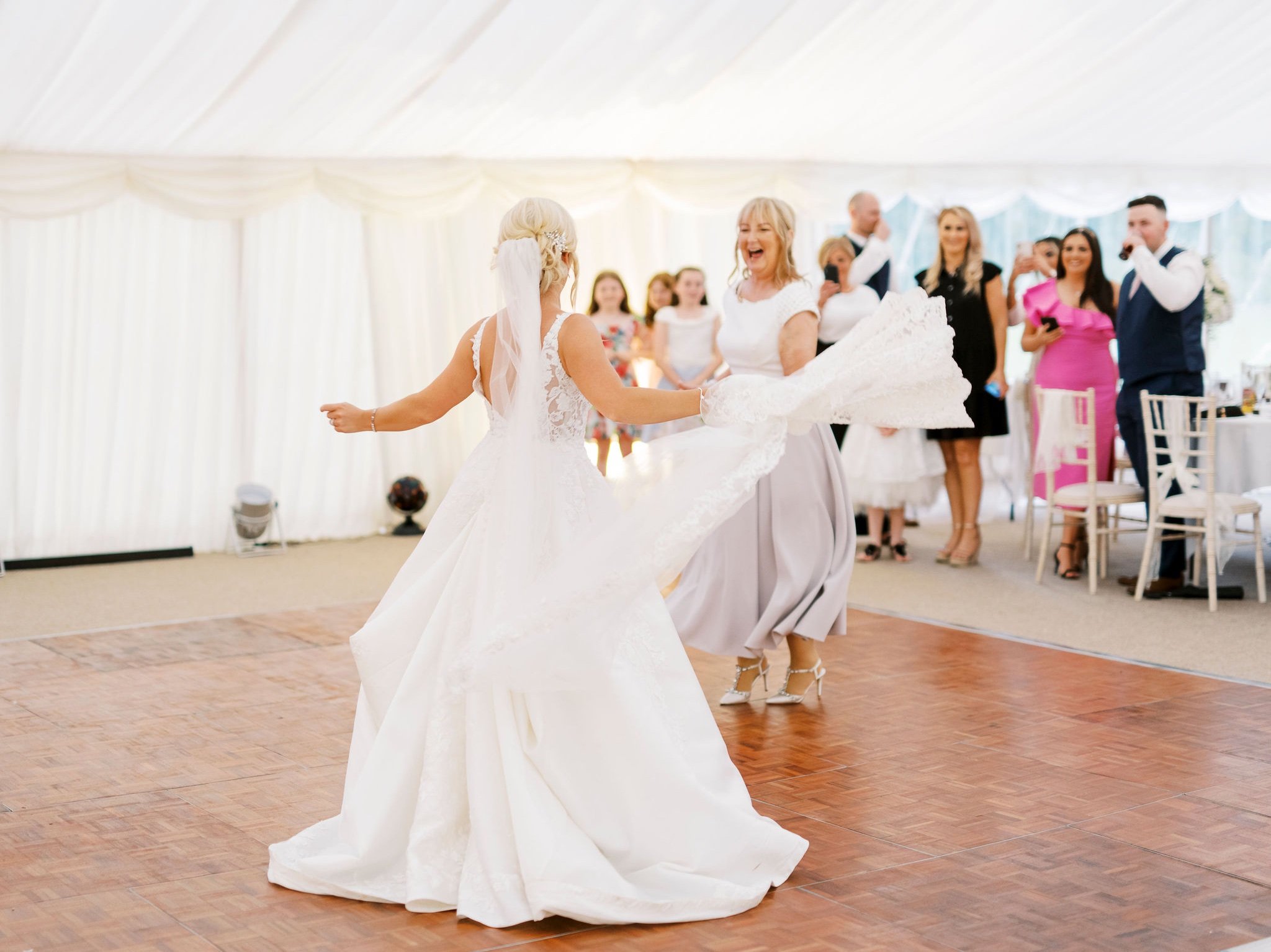 65_springkell-house-wedding-photographer-dumfries-scotland-bride-mum-dancing.jpg