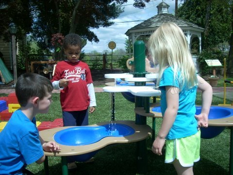 The water table allows for fun play during the warm weather
