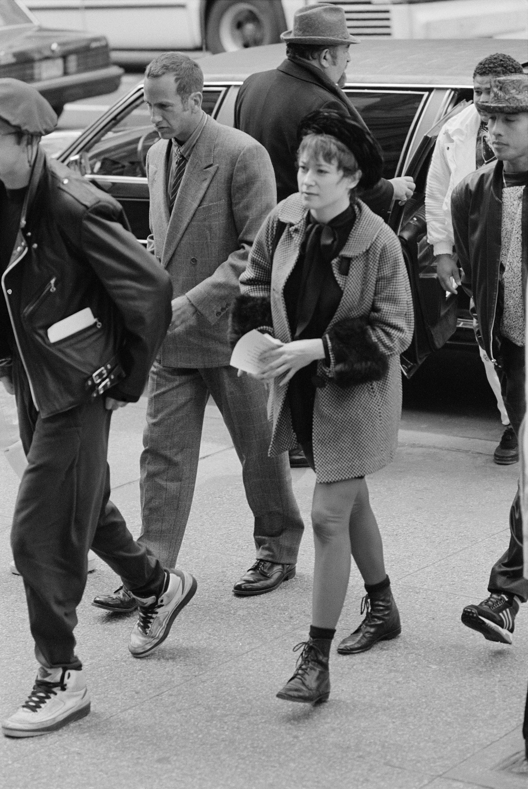 Artist Kenny Scharf, Actress Ann Magnuson & Keith Haring stepping out of frame