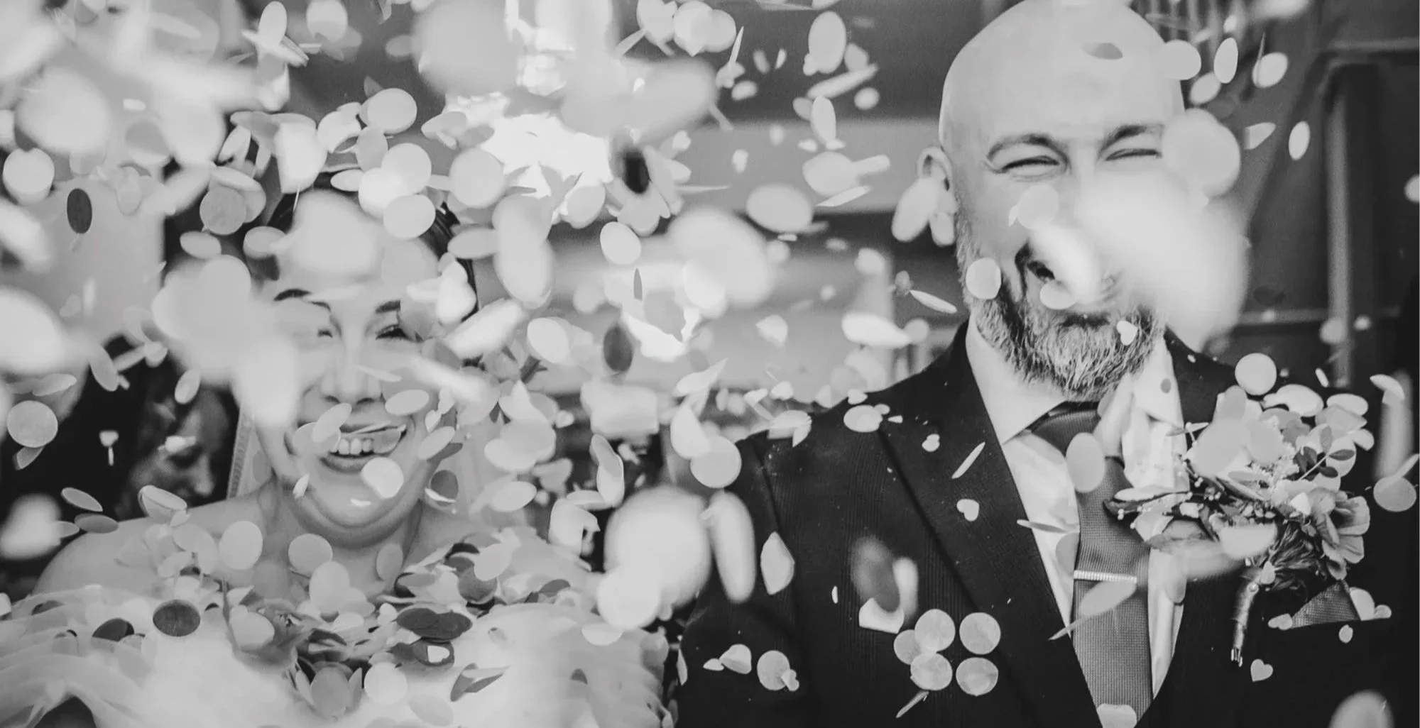 Bride and groom enter huge confetti throw
