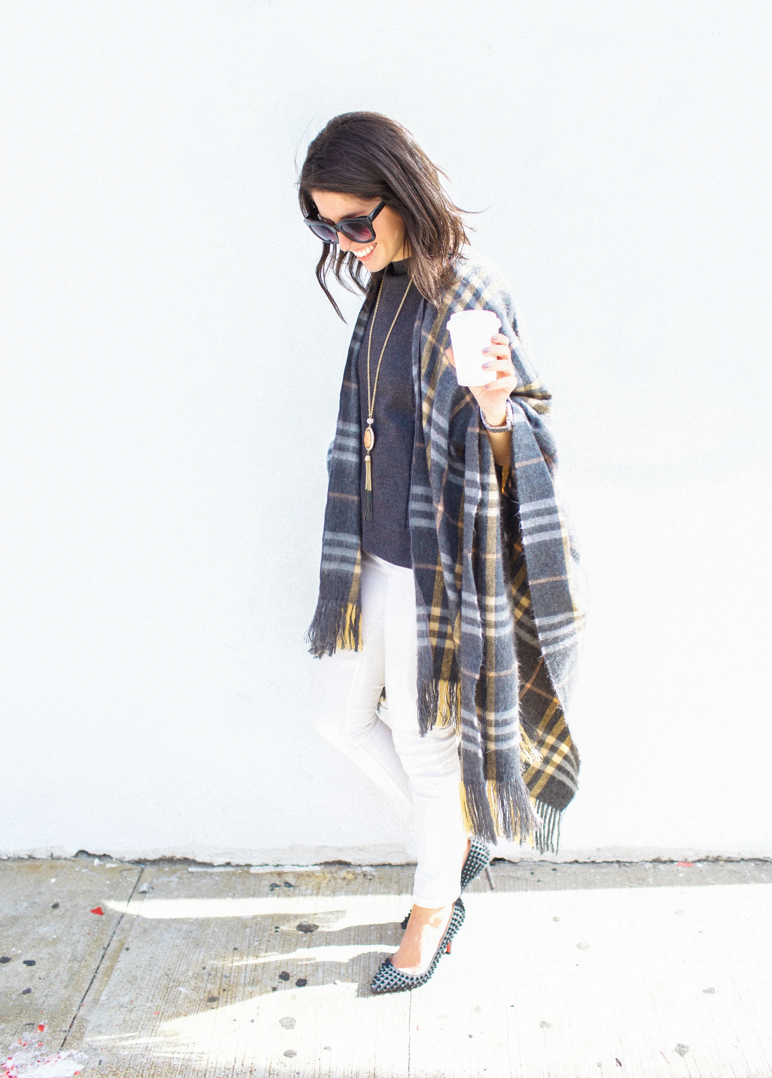  This plaid poncho has become a staple of my winter wear. Part scarf, part blanket, 100% cozy. Grey is one neutral I can't live without, and the white and peach plaid gives the design just enough detail while still making it highly mix-and-matchable.