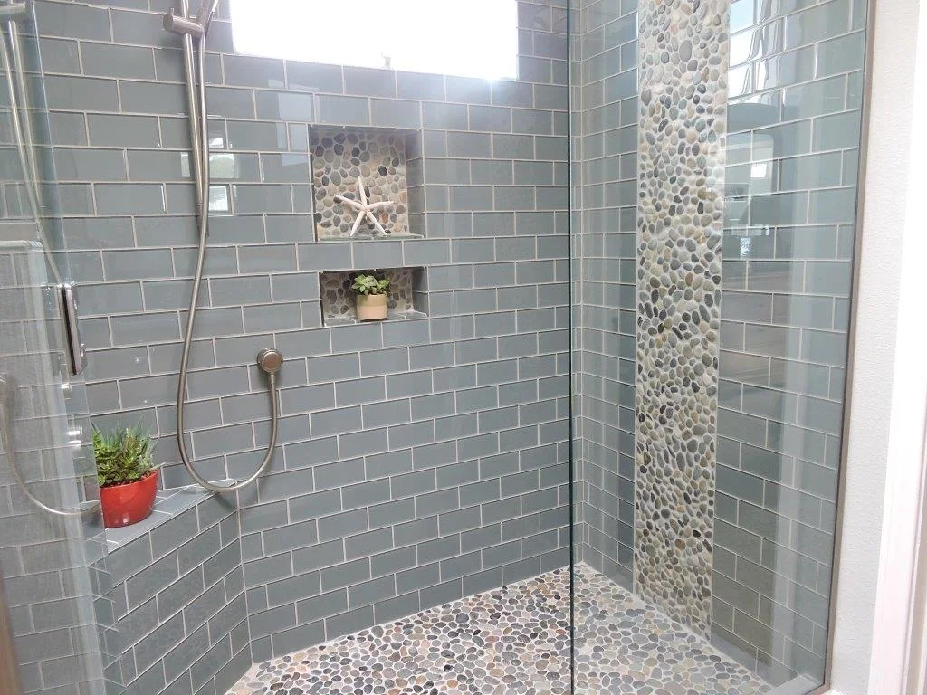 glass shower pebble floor.JPG