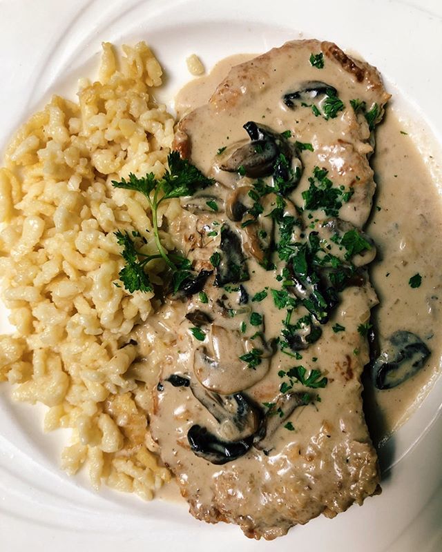 Making mouths water since 1939. Tonight we&rsquo;re featuring the j&auml;gerschnitzel. A white wine cream reduction sauce with onions, mushrooms and garlic make this schnitzel extra special. 
#germanfood 
#schnitzel 
#gutenappetit