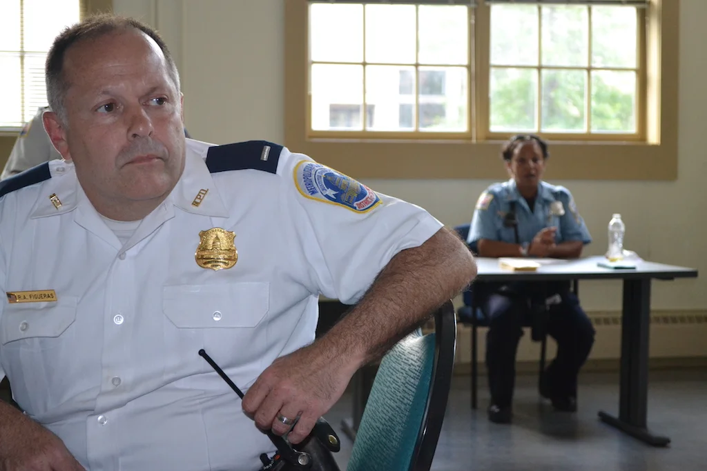 Lieutenant Raul Figueras PSA 404 manager. Officer Motley in the back.