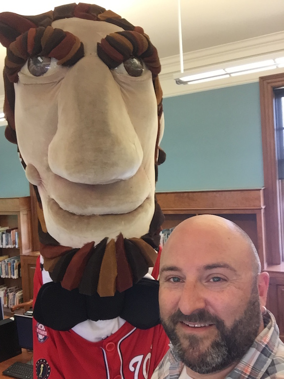   Washington Nationals Presidential mascot Abe Lincoln poses for a selfie with Drew at the Petworth Library. 5/30/15  