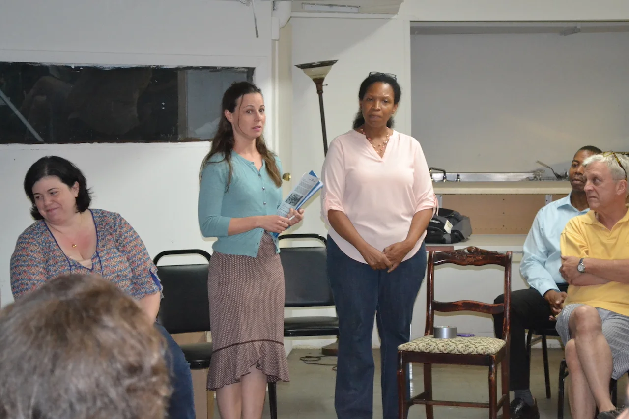 Emily Cohen and Audrey Nwanze talking with the residents.