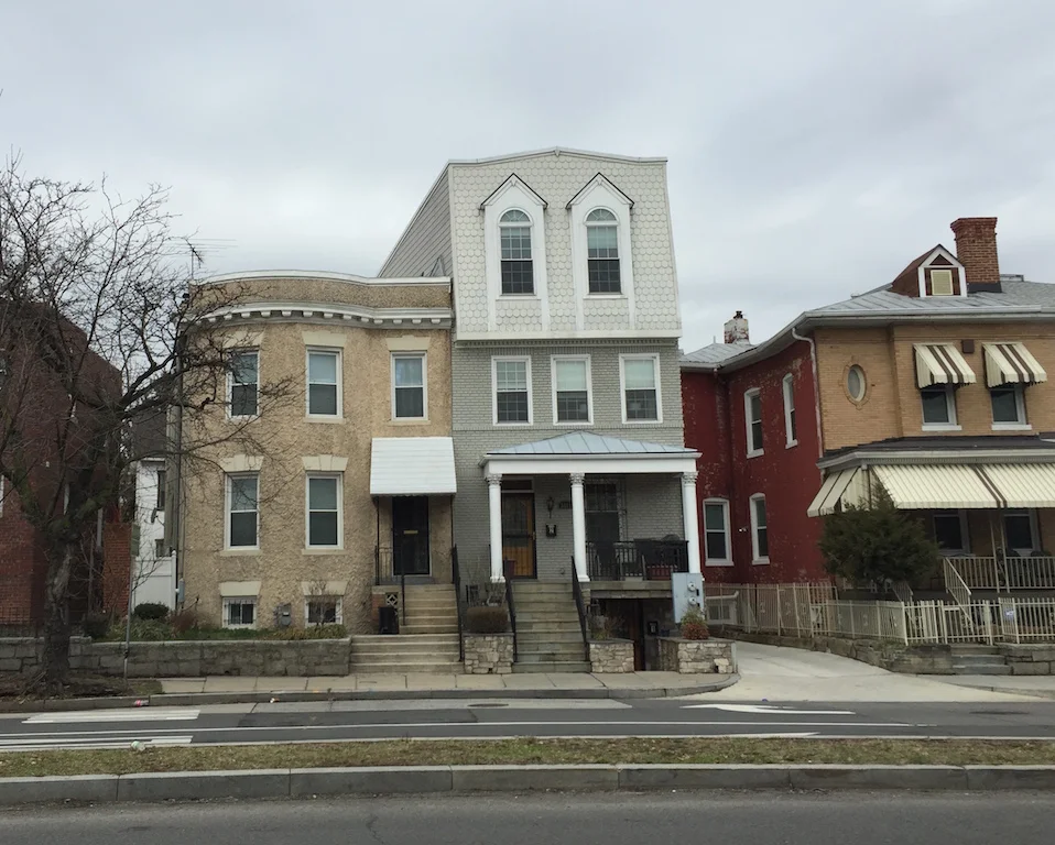 A terribly designed pop-up conversion on Sherman Avenue. The house looks perpetually surprised to me. 