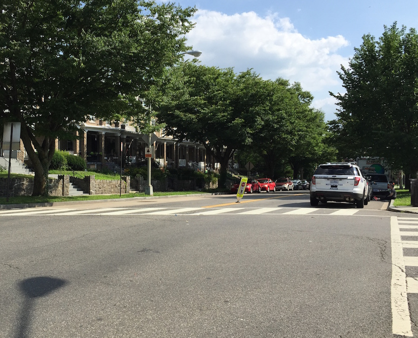 Looking down Kansas Avenue NW at the corner of Quincy Street.