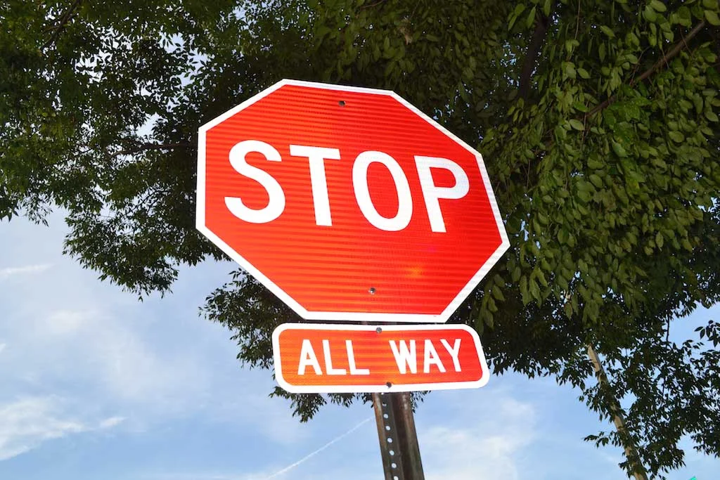 One of the new all-way stop signs at Quincy & Kansas