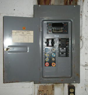 An old fuse box that needs replacement
