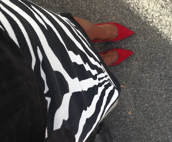 Zebra pattern, red shoes... awesome.