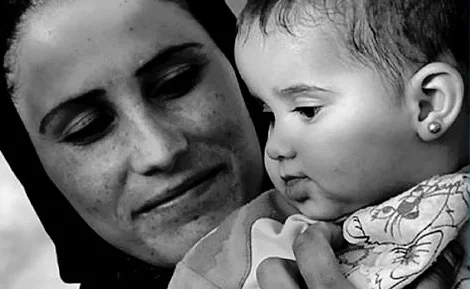 Donate a new or gently used baby carrier for refugees