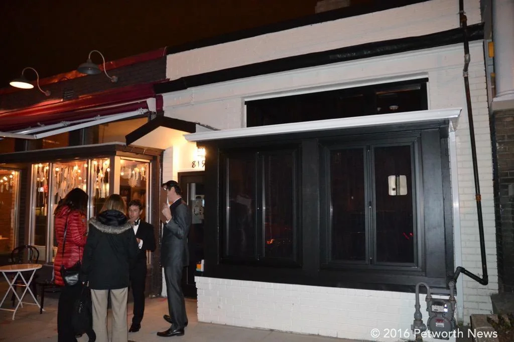 Tuxedo greeters checked in guests at the door.