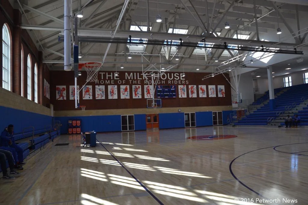 The gym with the opened roofline and new bleachers.