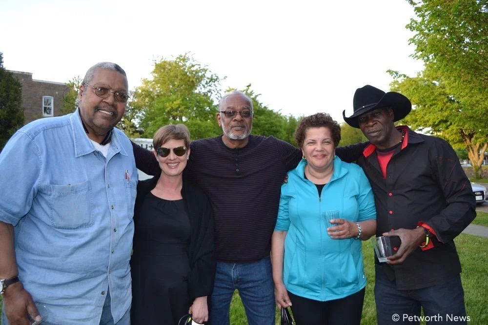 Woodie Head, Kirsten Spainhower, Lee Magruder, Karen Shaw and Ron Ceasar. "We're here because we heard about it from our neighbor, and we wanted to meet our neighbors."