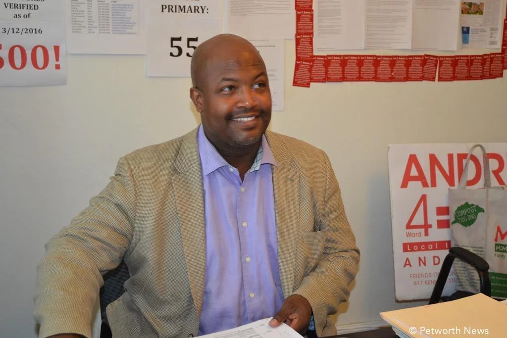The candidate at his desk at his campaign headquarters.