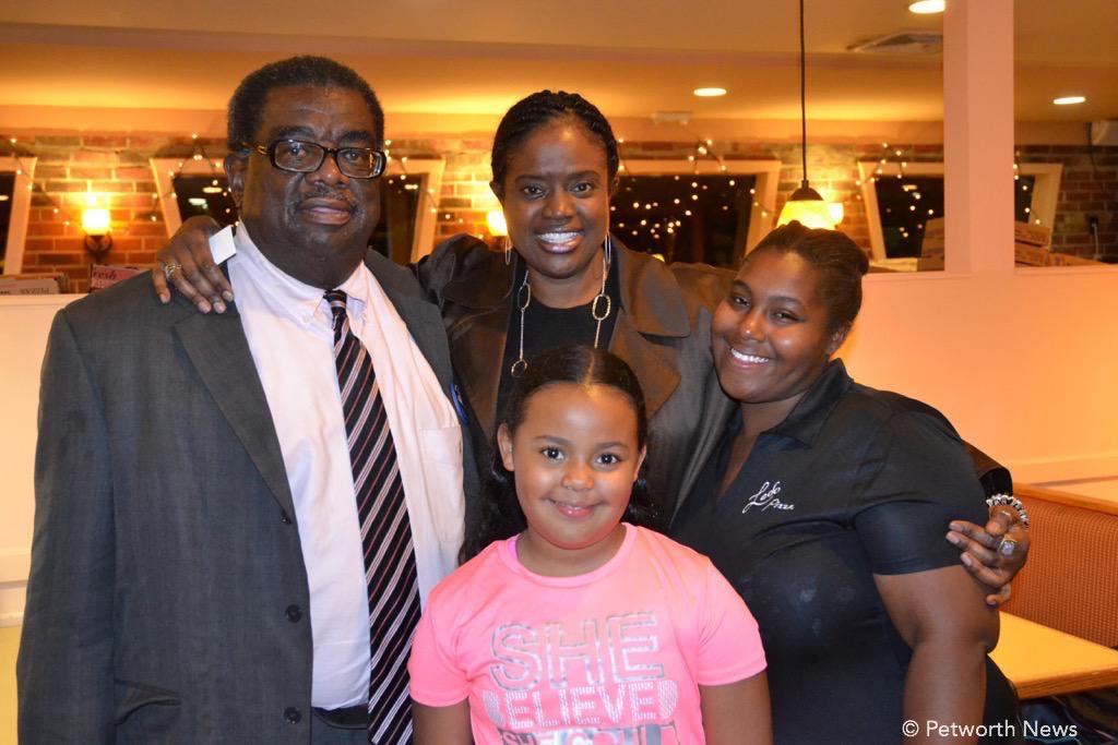 Ron Austin, with supporters Lisa, her daughter, and Neijan Boyd.