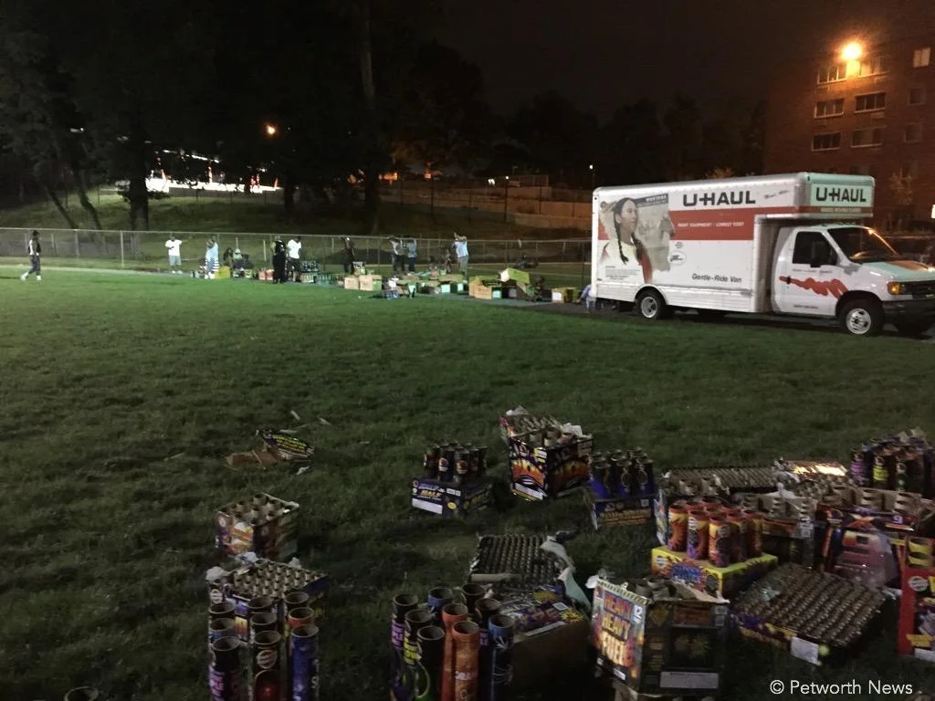 On the ball field across from Powell Elementary on Upshur Street. They brought all these fireworks via the U-Haul truck, much to the enjoyment of the crowd.