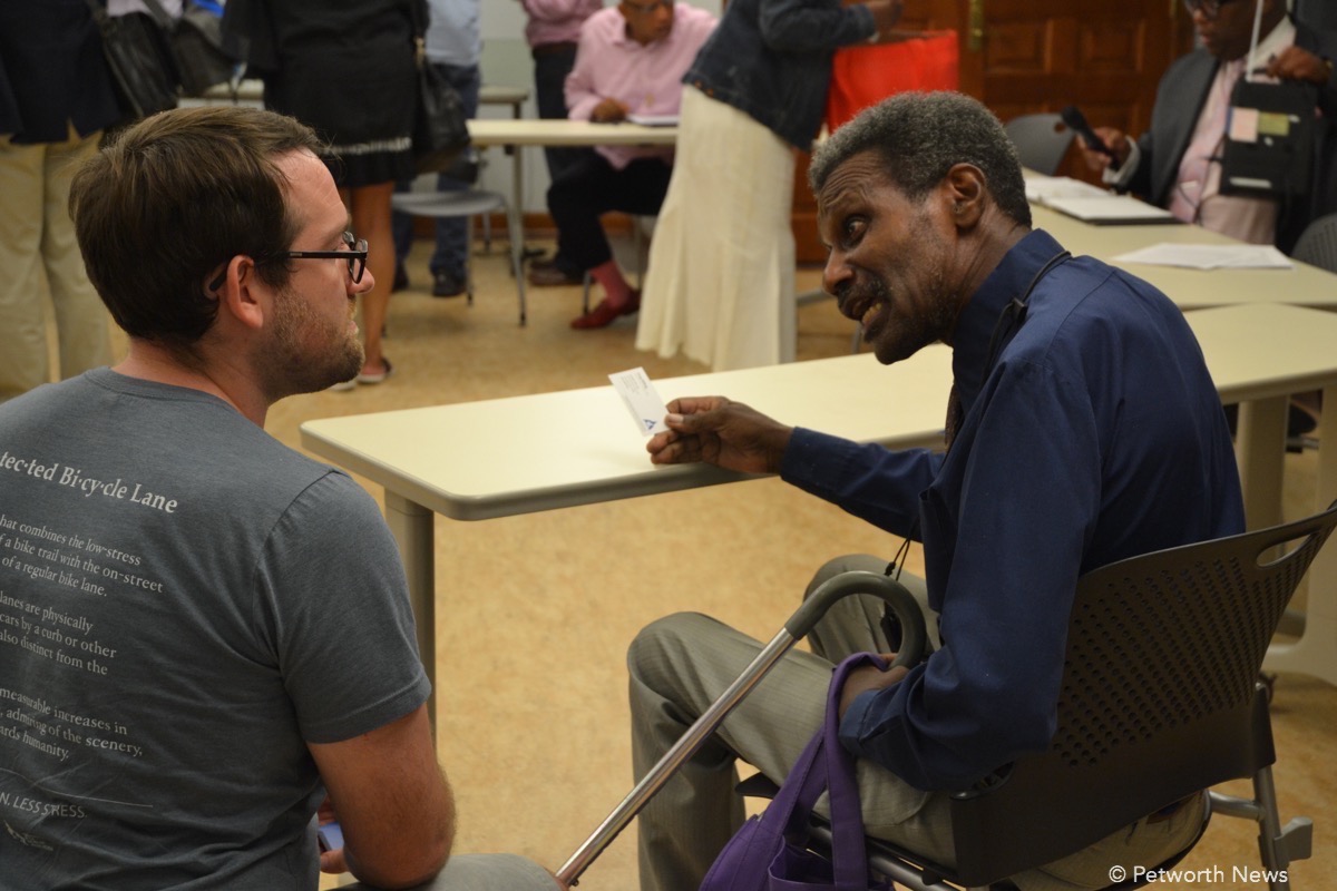 ANC 4C Commissioner Timothy Jones argues with Greg Billing, the Executive Director of the Washington Area Bicyclists Association at the August 10, 2016 meeting.