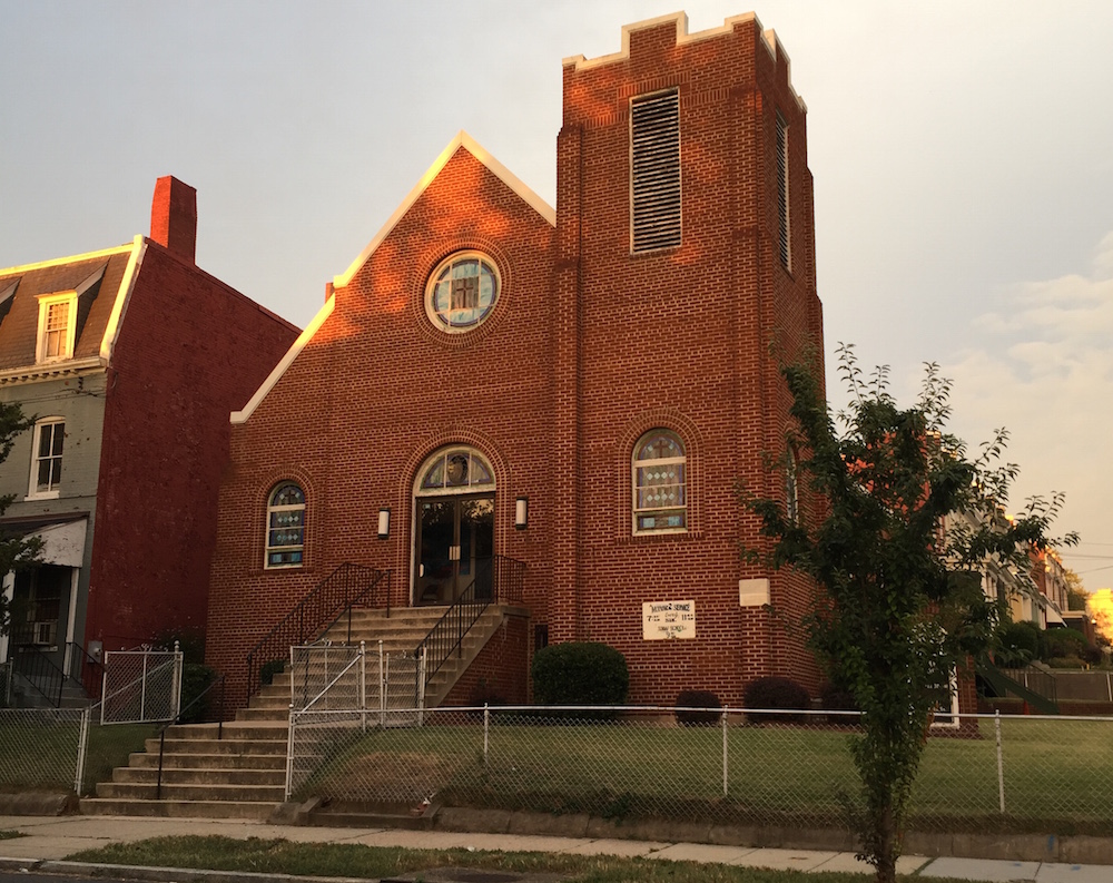 Rock Creek Church, before construction. The grey and red house on the left will be razed as well to make room for the new homes.