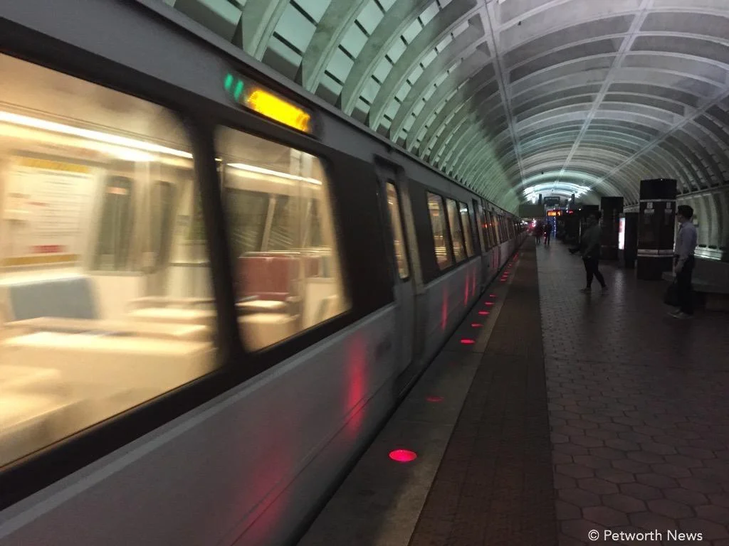 A Green line train pulls into the Georgia Avenue / Petworth station