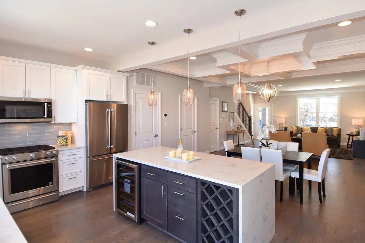 Open floor plan with amazing dining room ceiling.