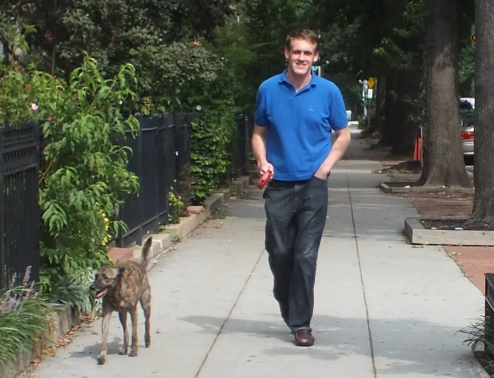 Owner Patrick Flynn walking one of his furry customers.