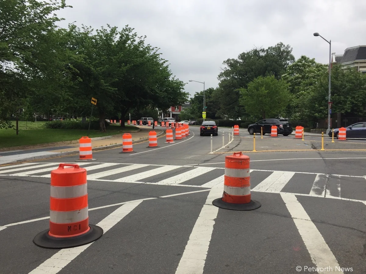 New traffic barrels up at Grant Circle for one-week test.