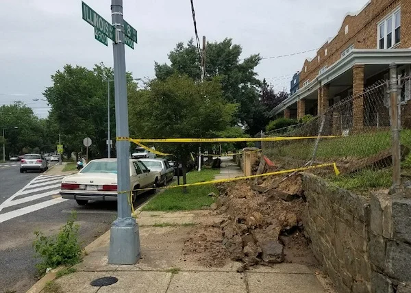 A collapsed retaining wall gets attention from DCRA and the Mayor's office