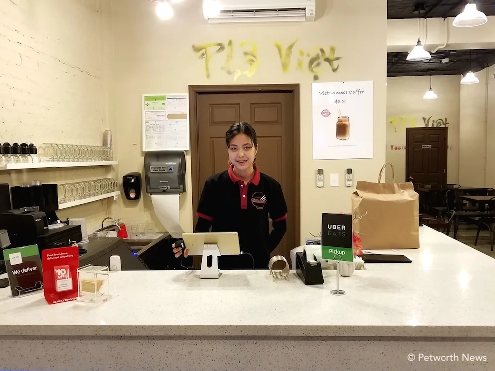 Pho Viet USA manager Layla Nguyen takes delivery orders