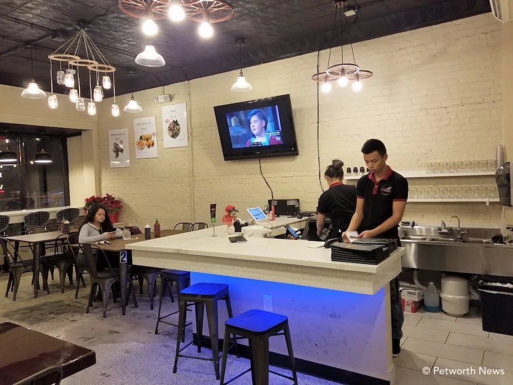 Pho Viet staff prepare delivery orders