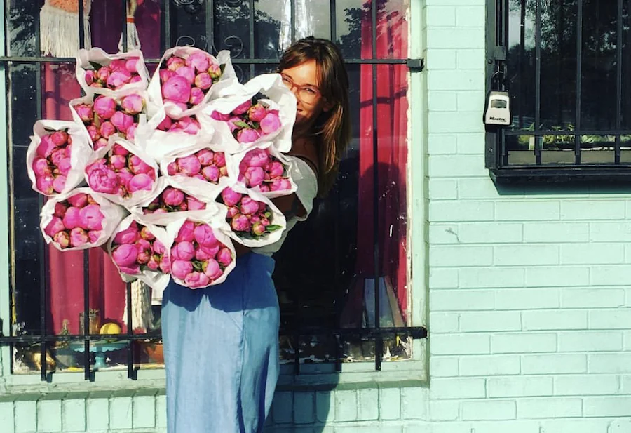 Holley with a bundle of roses (photo: Holley Simmons)